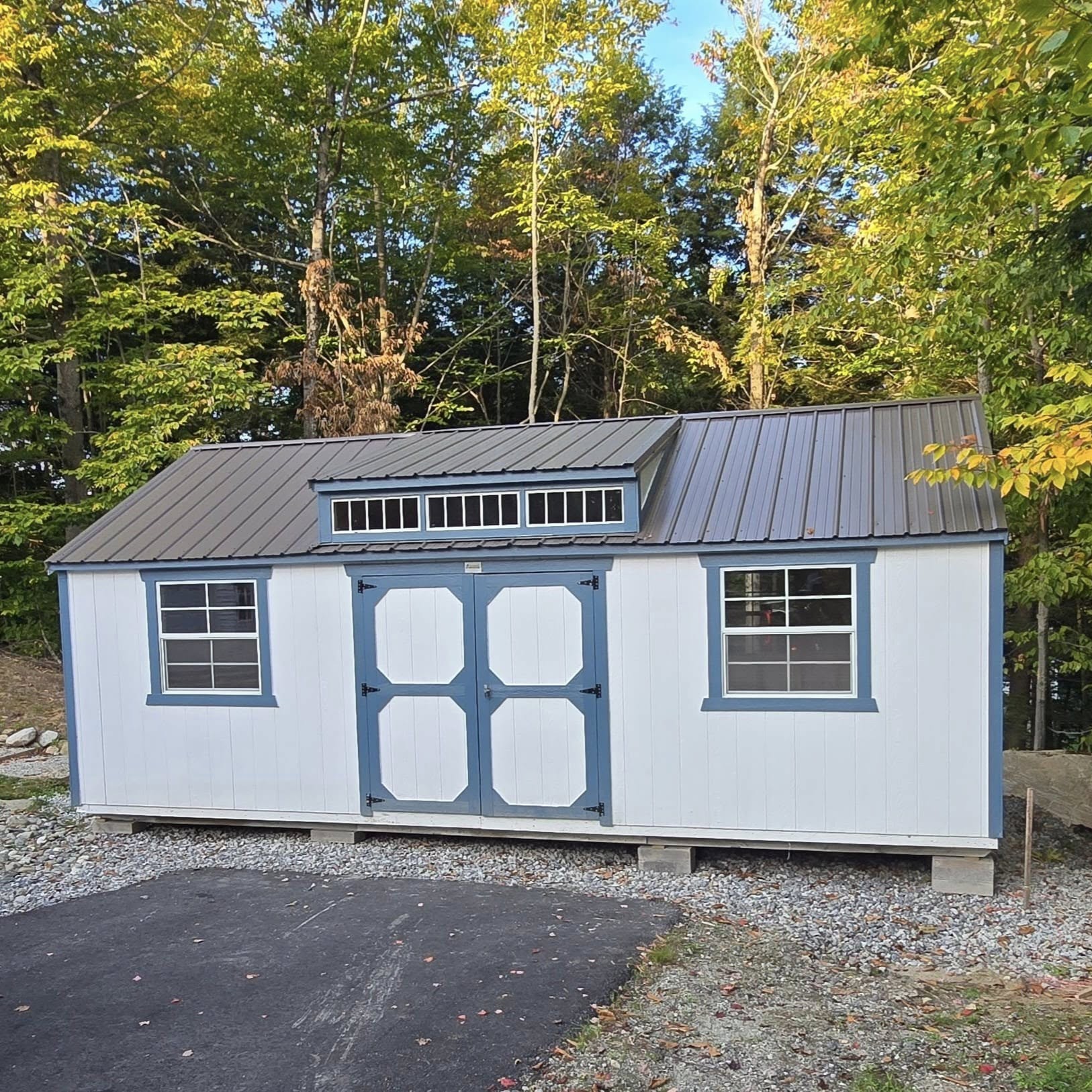 An Old Hickory storage shed with a shed dormer